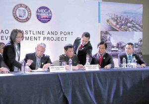 DAVAO City Mayor Rodrigo Duterte, who would officially be President on June 30, signs a P39-billion deal on June 21 for a city project to develop some of its coastal areas. CONTRIBUTED PHOTO